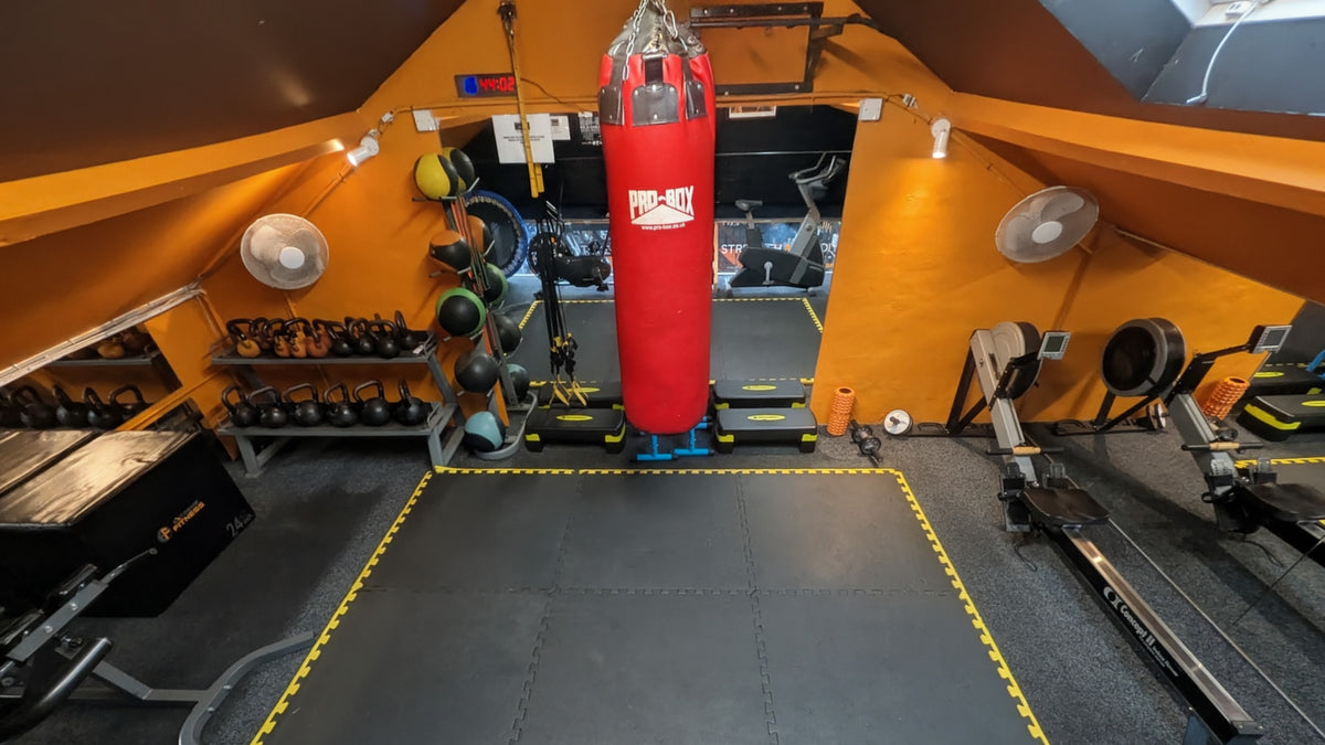 Boxing bag and kettlebell area at Phoenix Fitness Harrogate