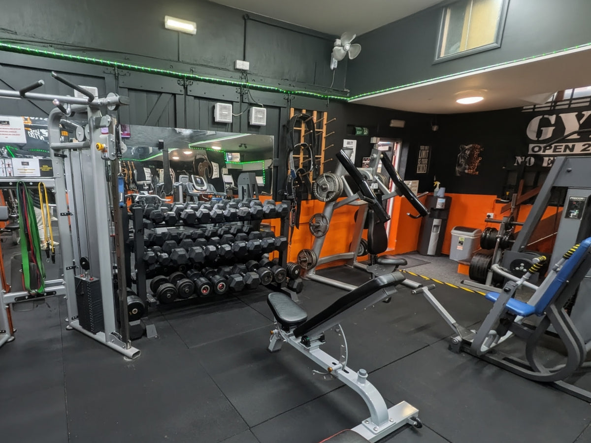 Dumbbell racks and benches at Phoenix Fitness Harrogate