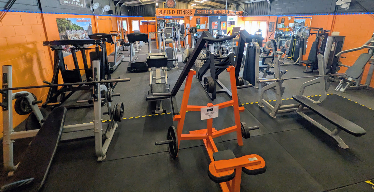 Plate loaded machines and benches at Phoenix Fitness Settle